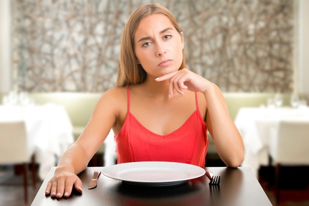 Vrouw met hongergevoel
